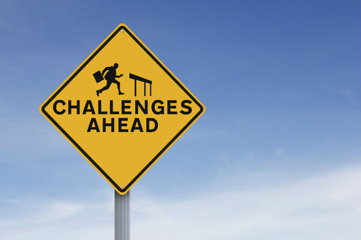 "Challenges Ahead" warning sign